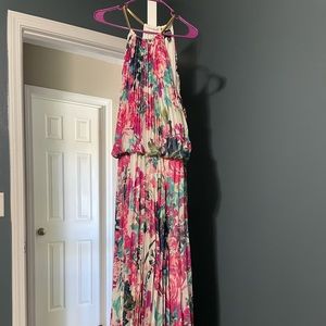 Ankle length pleated dress with gold neckline